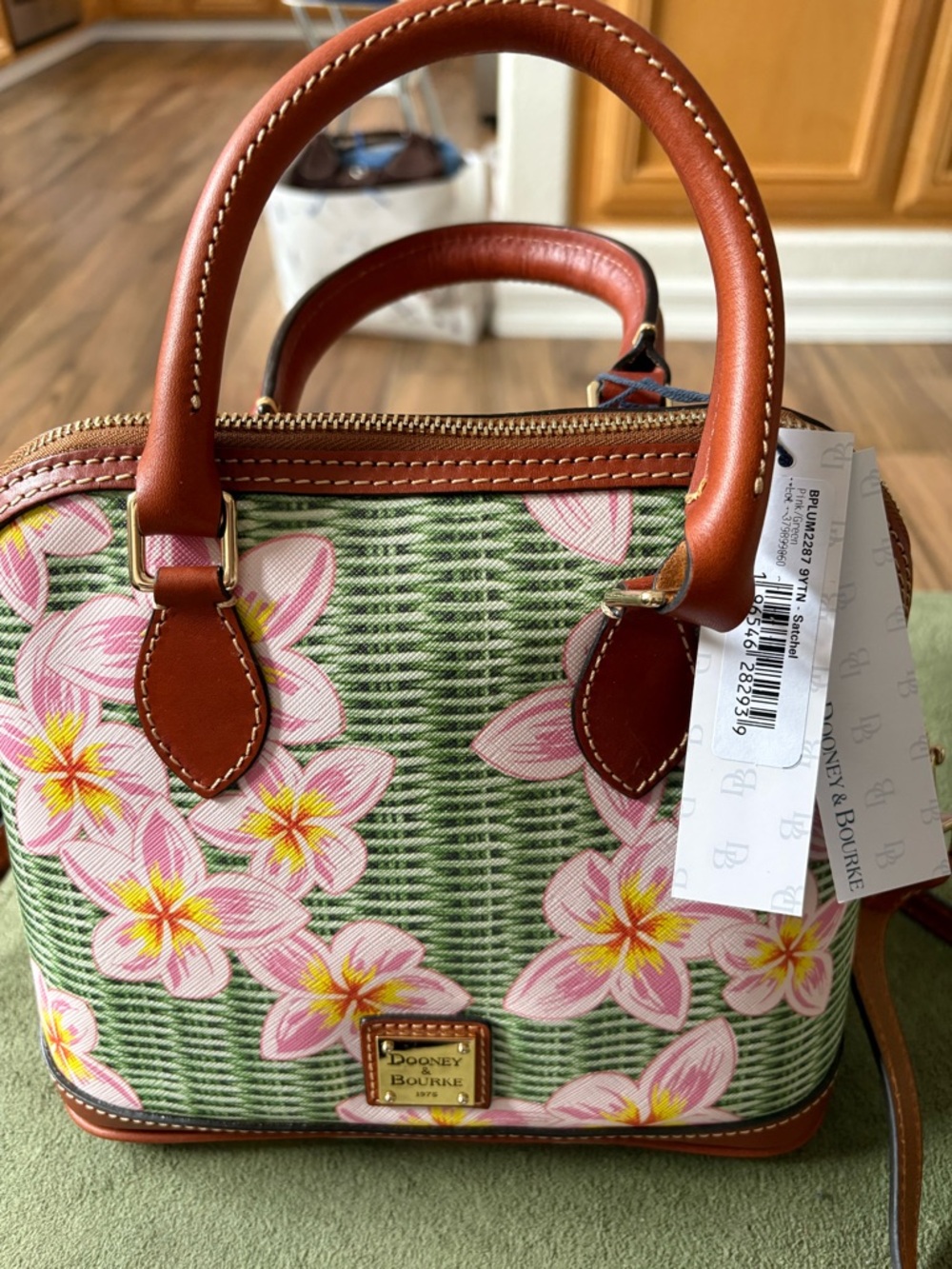 Dooney & Bourke NWT. Leather Satchel Handbag with Pink Plumeria Print